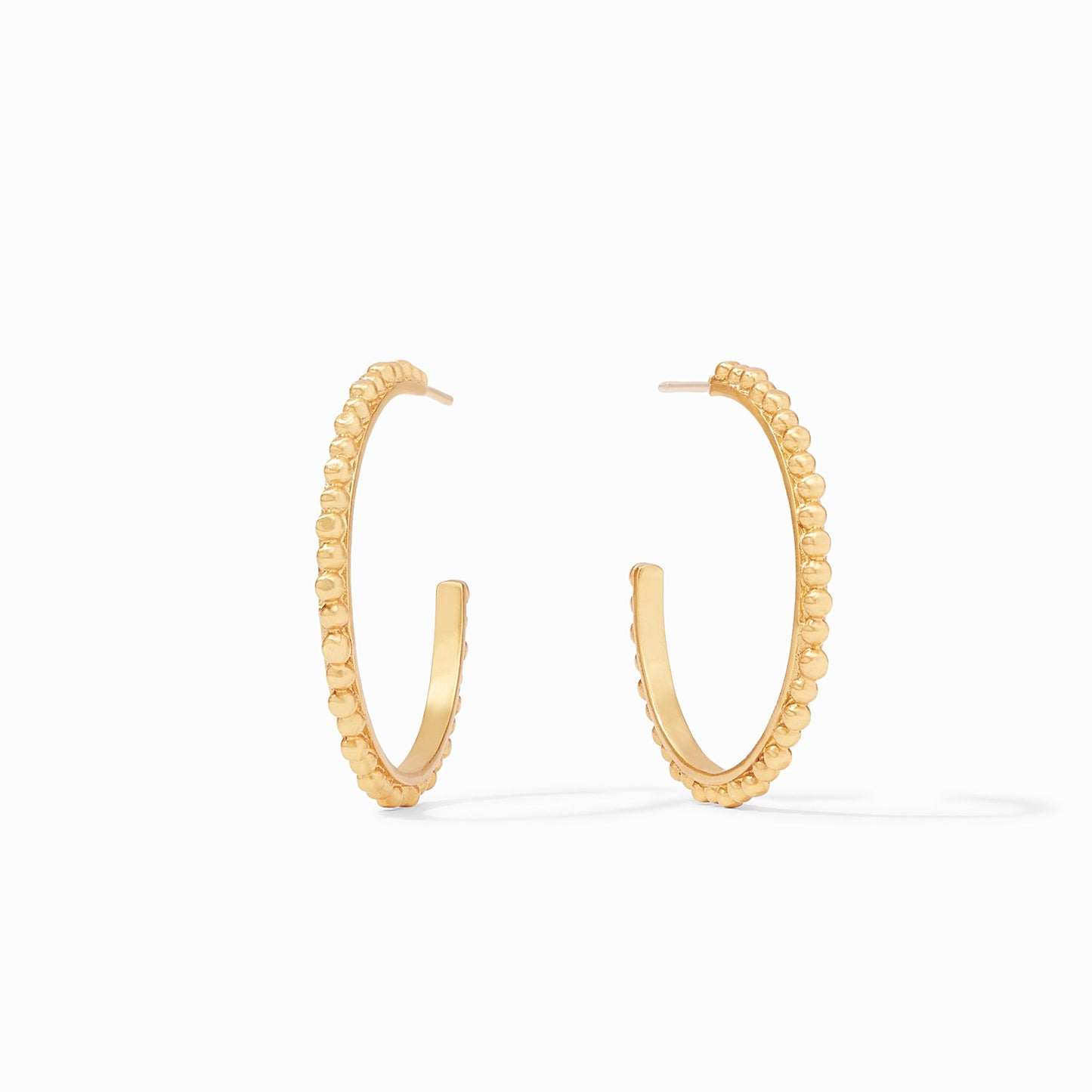 Slender hoop decorated with raised bead detail.