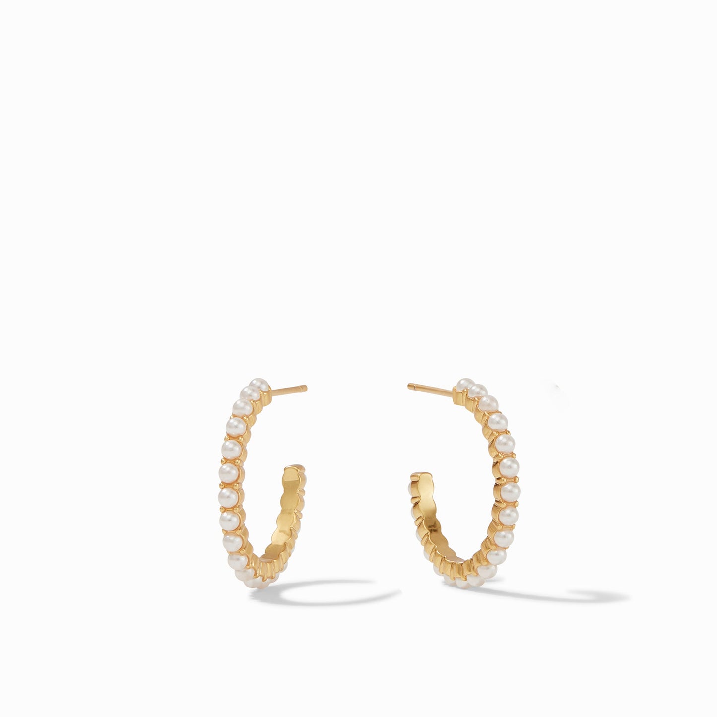 Delicate pearl-accented hoops.