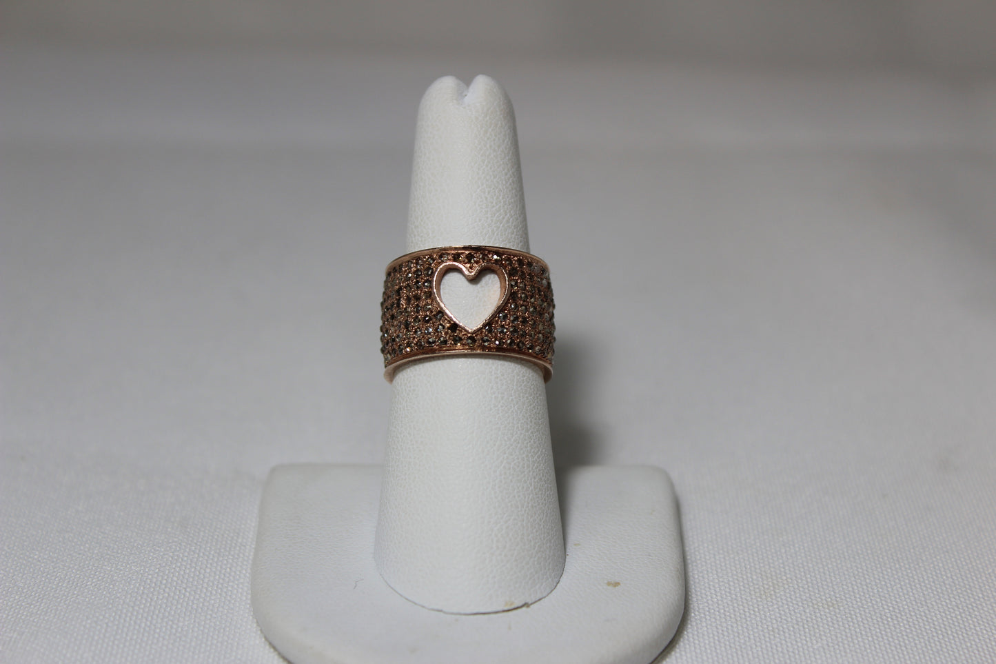 Pave diamond rose gold over sterling silver with cut out heart ring. Size 7 Sourced from India