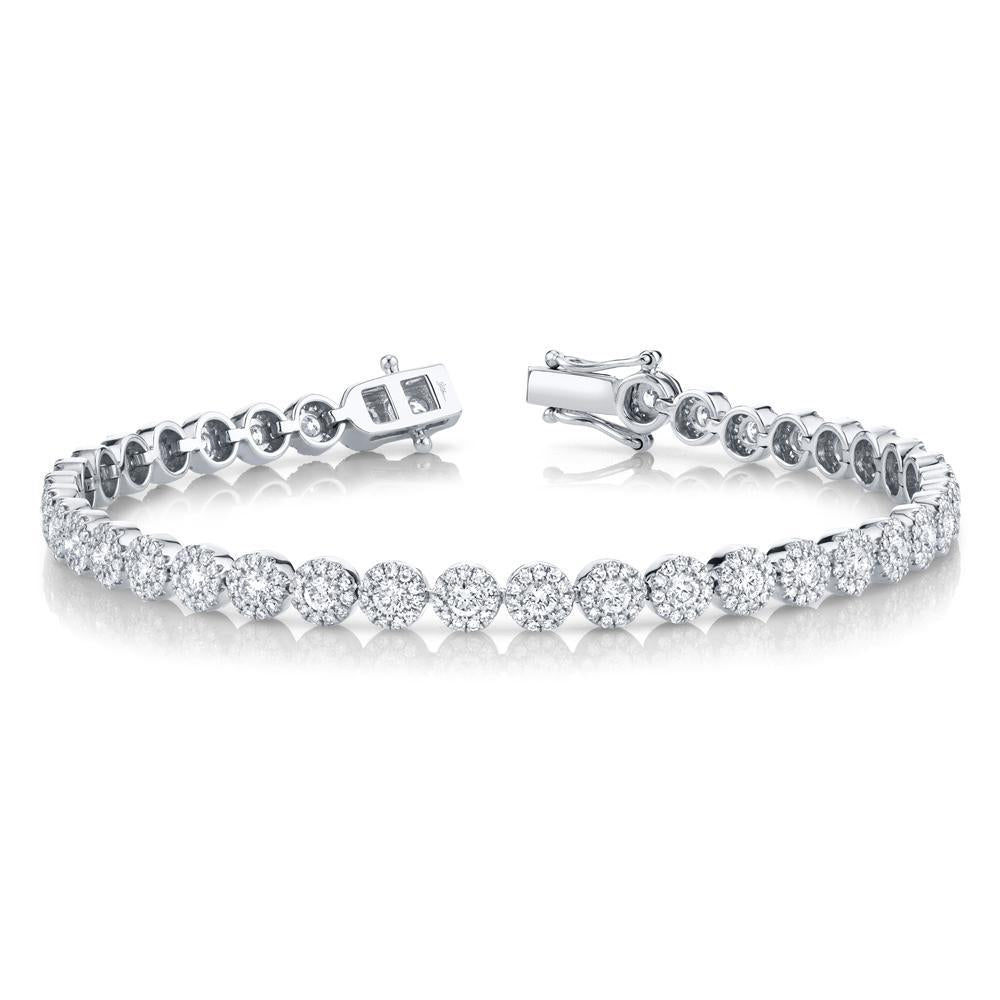 3.03CT 14K W/G diamond lady's bracelet All of our designs are handmade and slight variations may exist. All Shy Creation items are hand set and all stones are natural and hand-picked. Each piece is unique and you can expect slight variations in the shade, hue, and tint of the color stones.