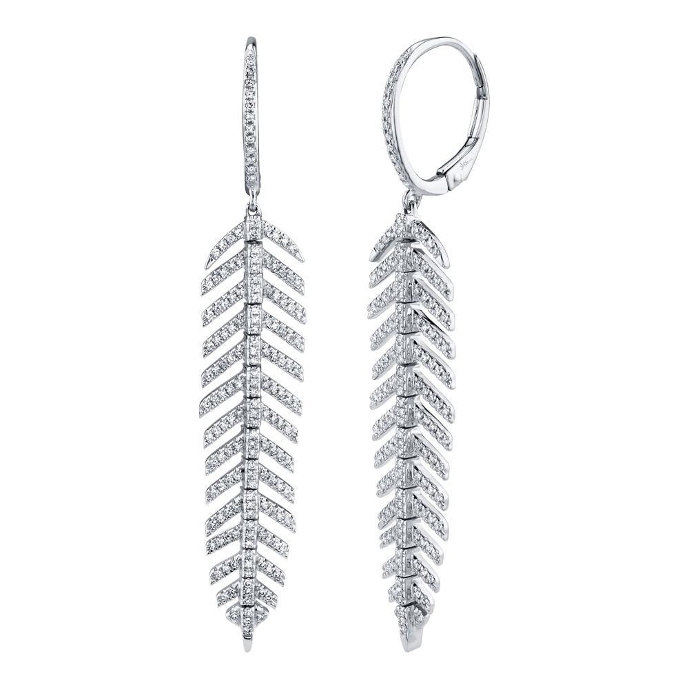 0.60CT DIAMOND 'PHOENIX' DROP FEATHER EARRING - SHORT The ultra unique 'Phoenix' drop dangle feather earrings highlight Shy Creation's commitment to impeccable design and craftsmanship. Delicately hinged, the 'Phoenix' motif curves and caresses like silk - a must-have for every jewelry collection. EDITOR'S NOTES: 14K Yellow Gold Short Version - 2.15" Long Hinged Back Closure 0.60 Carat Weight Available in: Yellow, Rose, and White Gold.