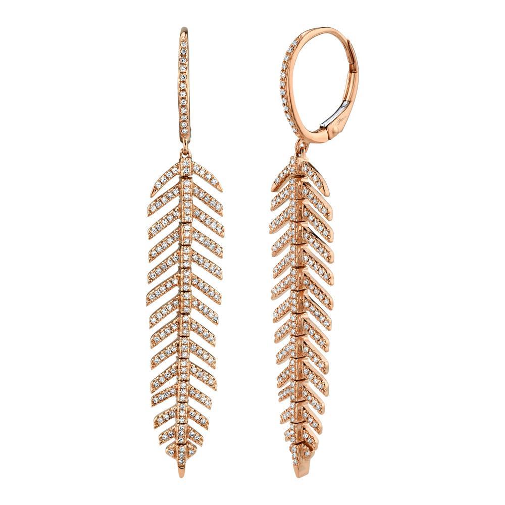 0.60CT DIAMOND 'PHOENIX' DROP FEATHER EARRING - SHORT The ultra unique 'Phoenix' drop dangle feather earrings highlight Shy Creation's commitment to impeccable design and craftsmanship. Delicately hinged, the 'Phoenix' motif curves and caresses like silk - a must-have for every jewelry collection. EDITOR'S NOTES: 14K Yellow Gold Short Version - 2.15" Long Hinged Back Closure 0.60 Carat Weight Available in: Yellow, Rose, and White Gold.
