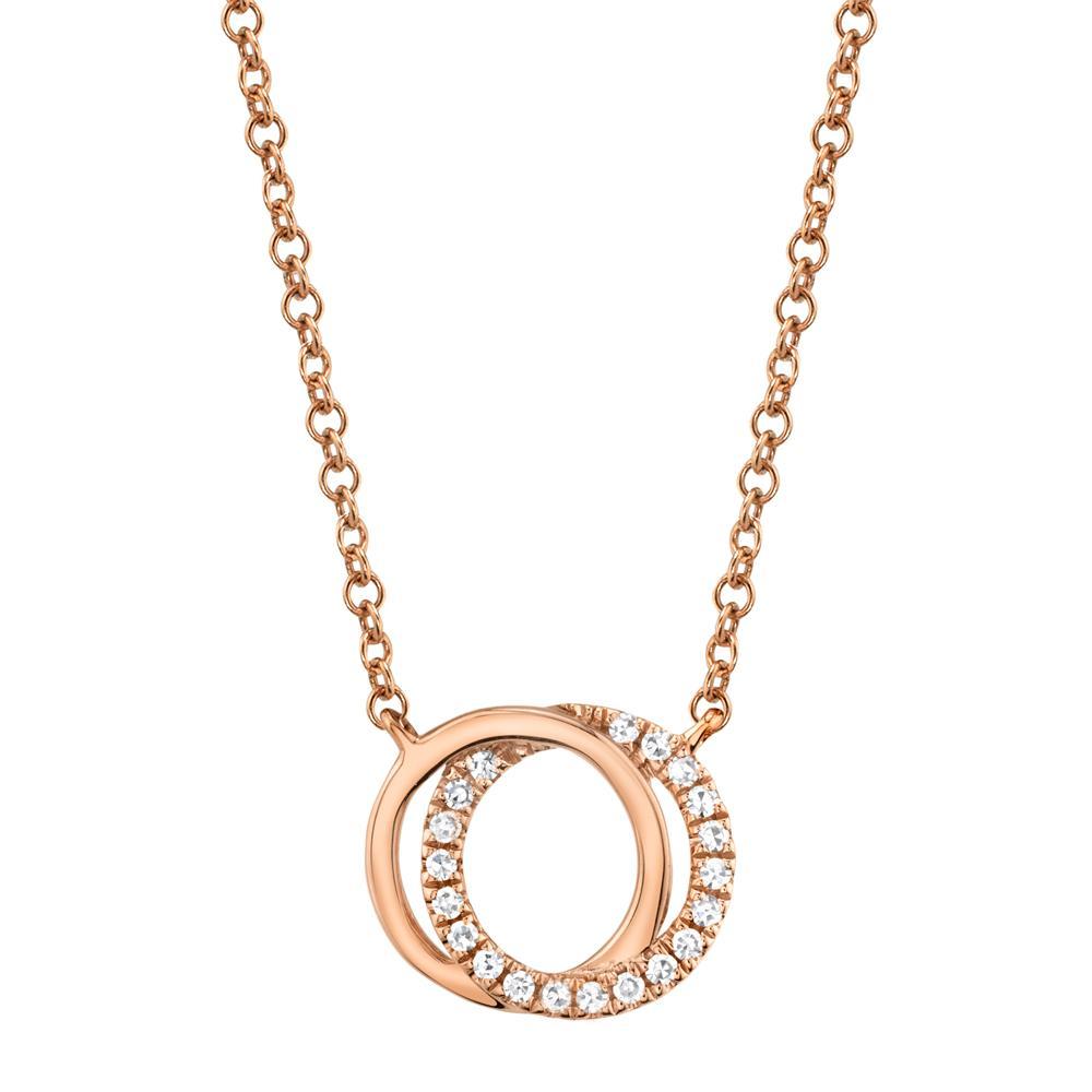 0.07CT DIAMOND LOVE KNOT CIRCLE PENDANT NECKLACE Shy Creation's classic love knot pendant necklace showcases a delicate interlocked knot design decorated with sparkling pave diamonds. A perfect 'just because' gift for someone special and can be worn alone or layer for a fashion forward look. EDITOR'S NOTES: 14K Yellow Gold Lobster Clasp Closure 0.07 Carat Weight Available in: Yellow, Rose, and White Gold.