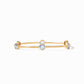 A lightly hammered bangle features six circular gemstones that sit along the length of this slim bangle, making it perfect for mixing and matching to create a striking color story on your wrist.
