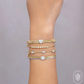 0.50CT 14K Y/G DIAMOND BEZEL BANGLE