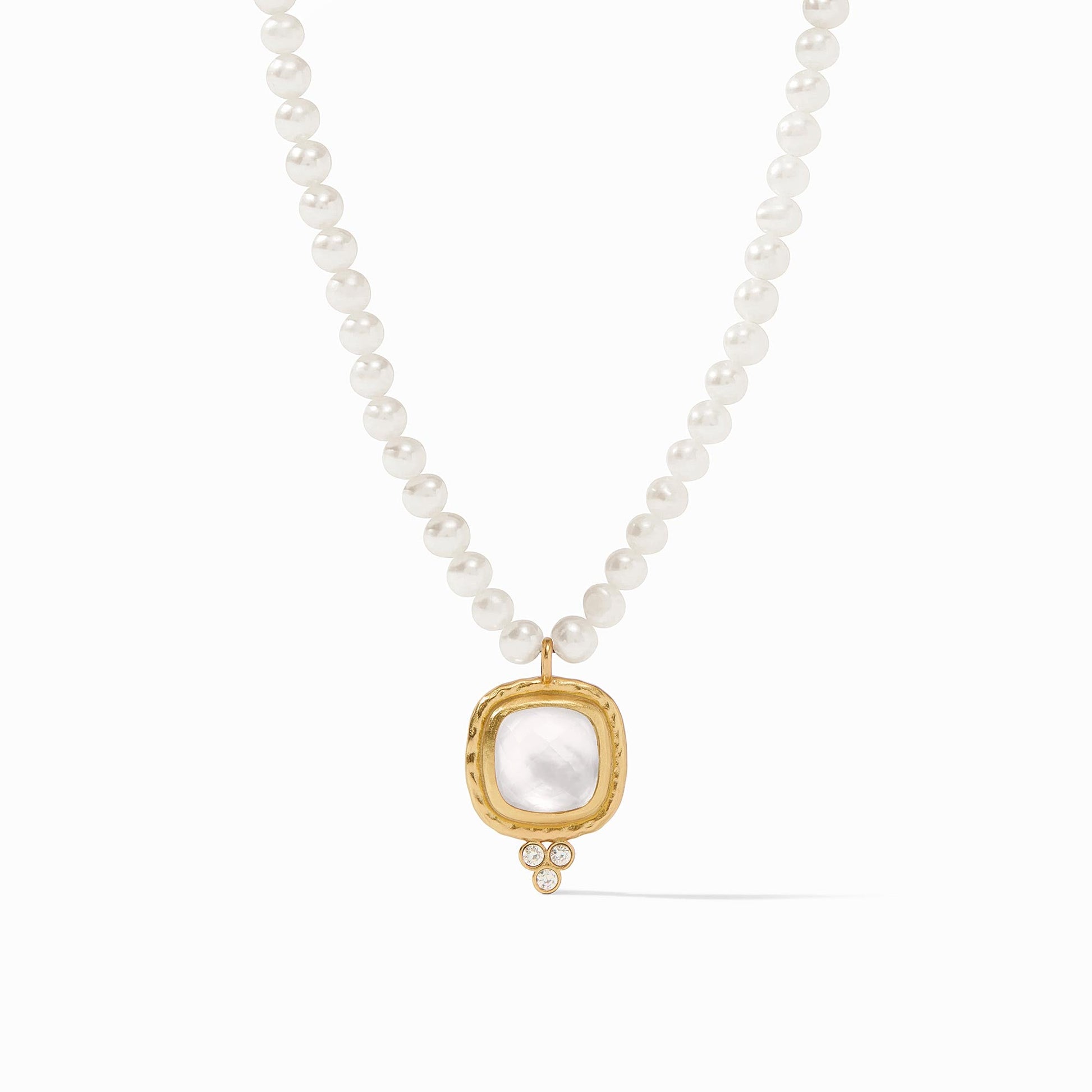 A delicate strand of freshwater pearls leads the eye to a sublime pendant composed of a classic cushion cut gemstone atop a trio of CZs.