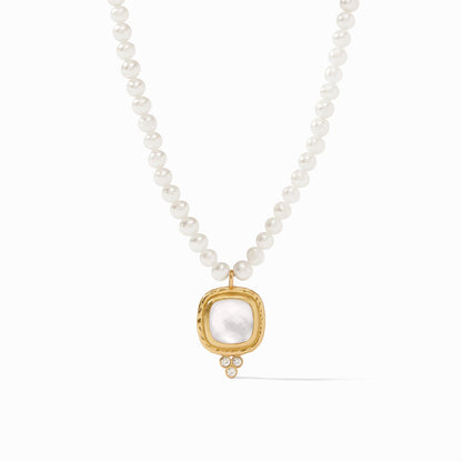 A delicate strand of freshwater pearls leads the eye to a sublime pendant composed of a classic cushion cut gemstone atop a trio of CZs.