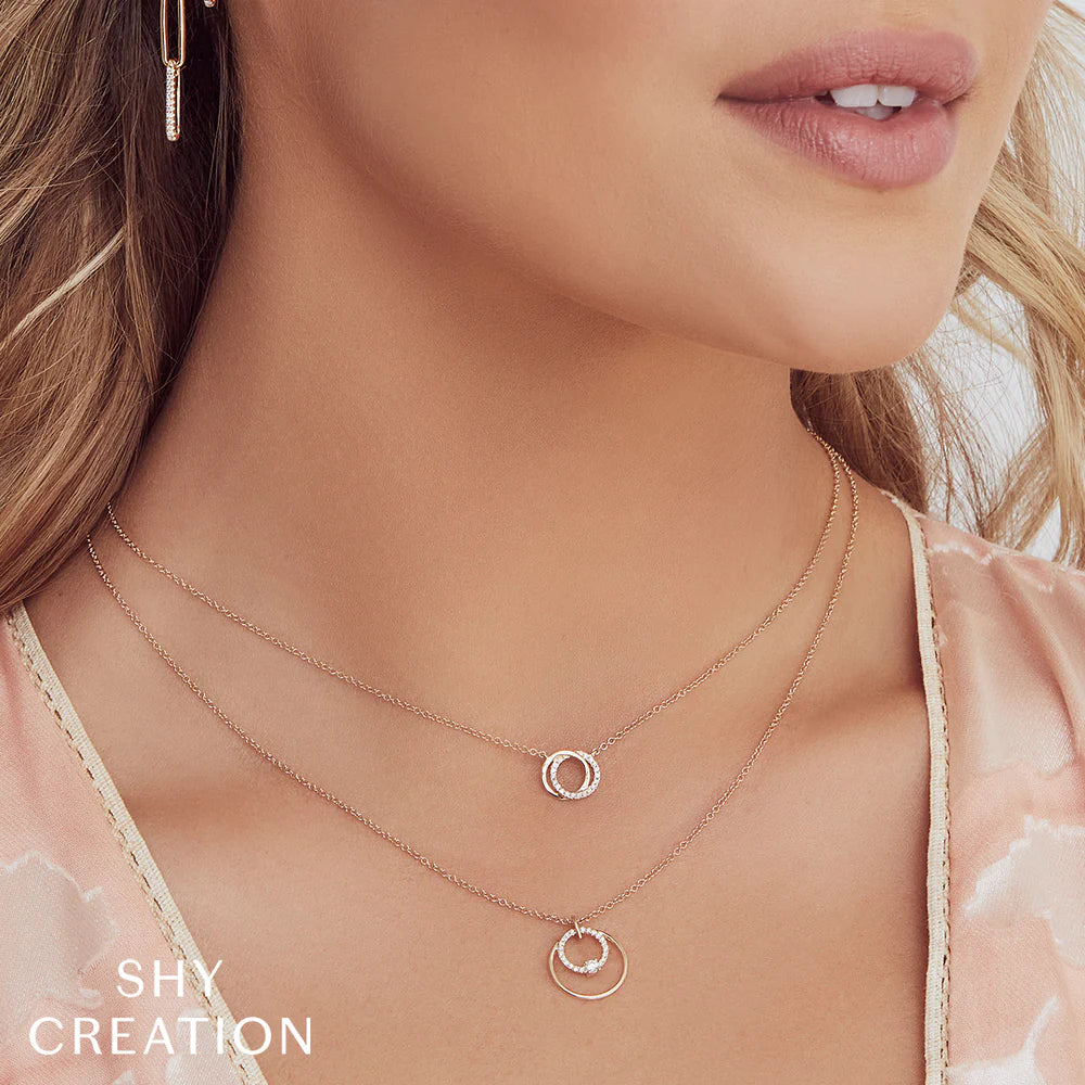 0.07CT DIAMOND LOVE KNOT CIRCLE NECKLACE