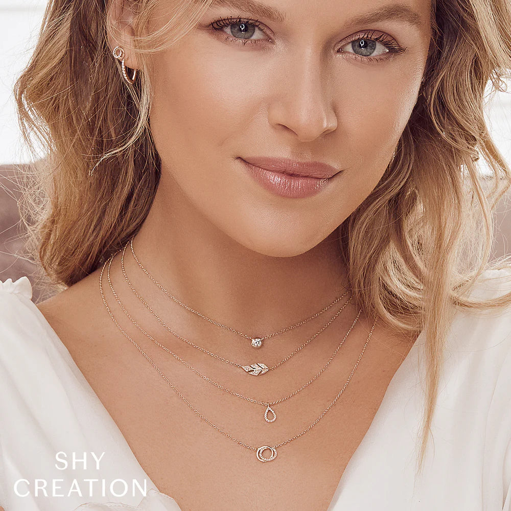 0.07CT DIAMOND LOVE KNOT CIRCLE NECKLACE
