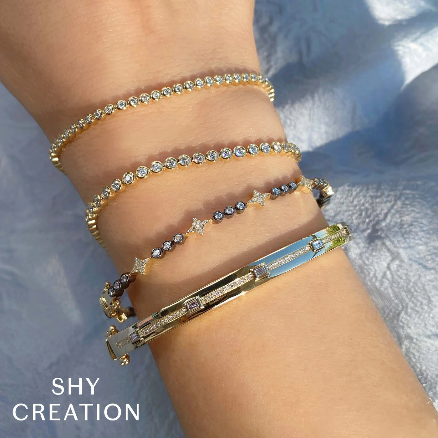 0.64CT DIAMOND BEZEL TENNIS BRACELET