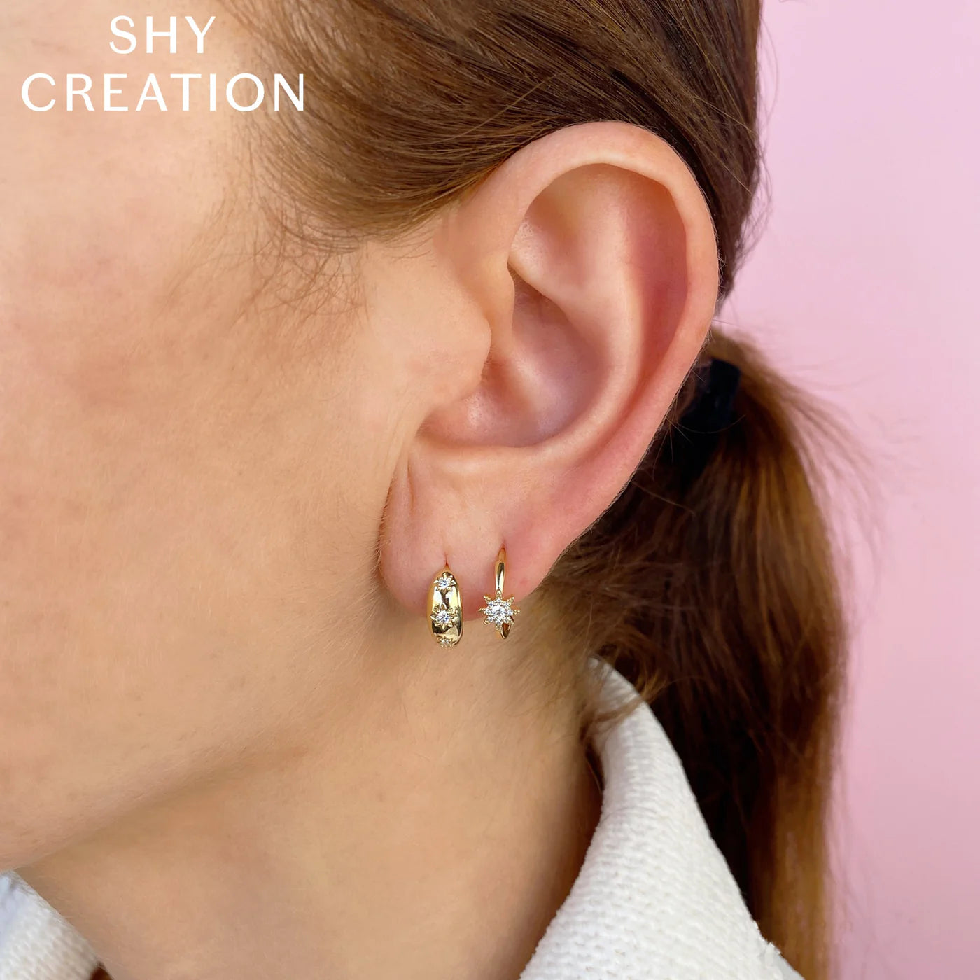 0.10CT DIAMOND STARBURST HUGGIE EARRING