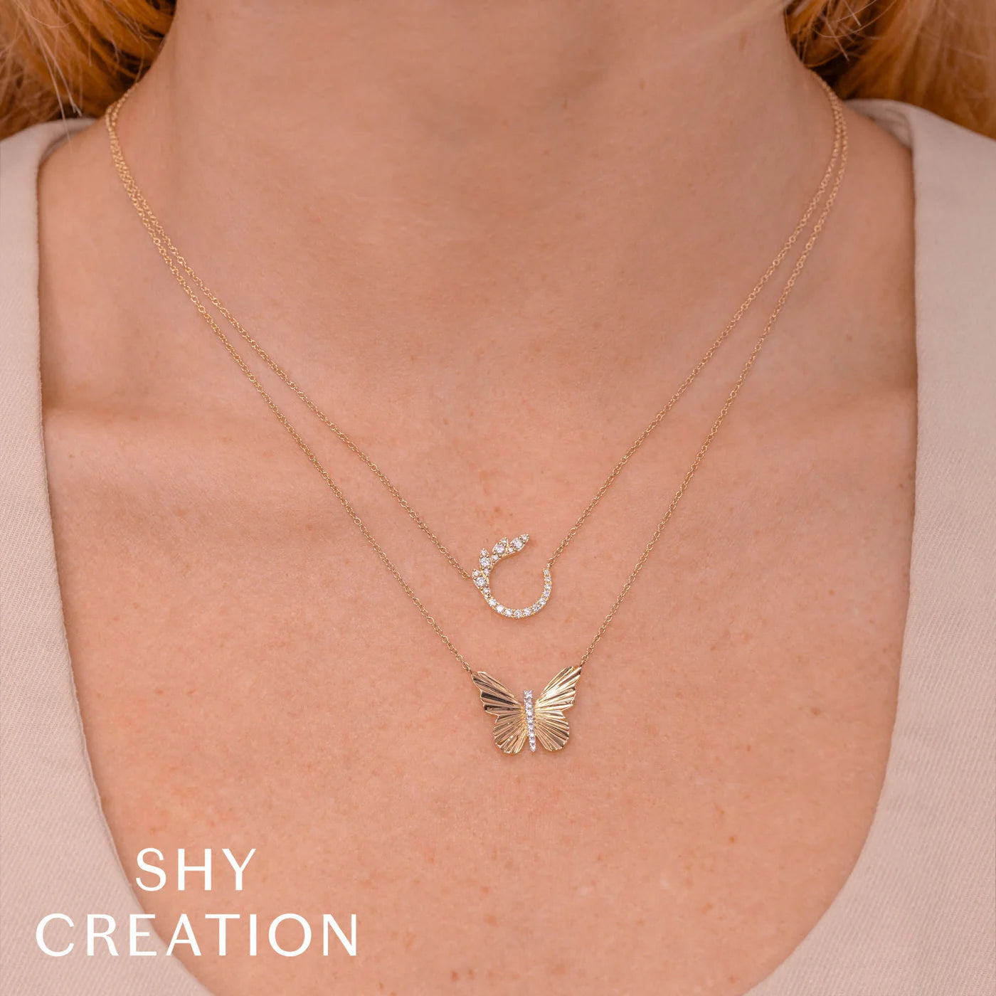 0.06CT DIAMOND RIBBED BUTTERFLY NECKLACE
