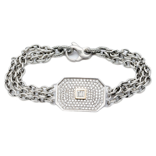 This triple-strand bracelet features a satin-finish, sterling silver, chamfered rectangle covered in diamond pavé and accented by two baguette diamonds bezel-set in 14K yellow gold in the center on our exclusive steel chain.  Includes a Liza Beth signature satin finish diamond clasp  Dimensions of rectangle: 25 mm x 18 mm  Total diamond carat weight: 1.47 ct  Made in USA