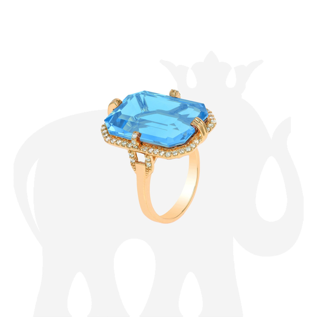 'Gossip' 14 x 20mm Blue Topaz Emerald Cut Ring 18K Yellow Gold with diamonds Approx Weight BT-22.88cts Dia-.41cts.