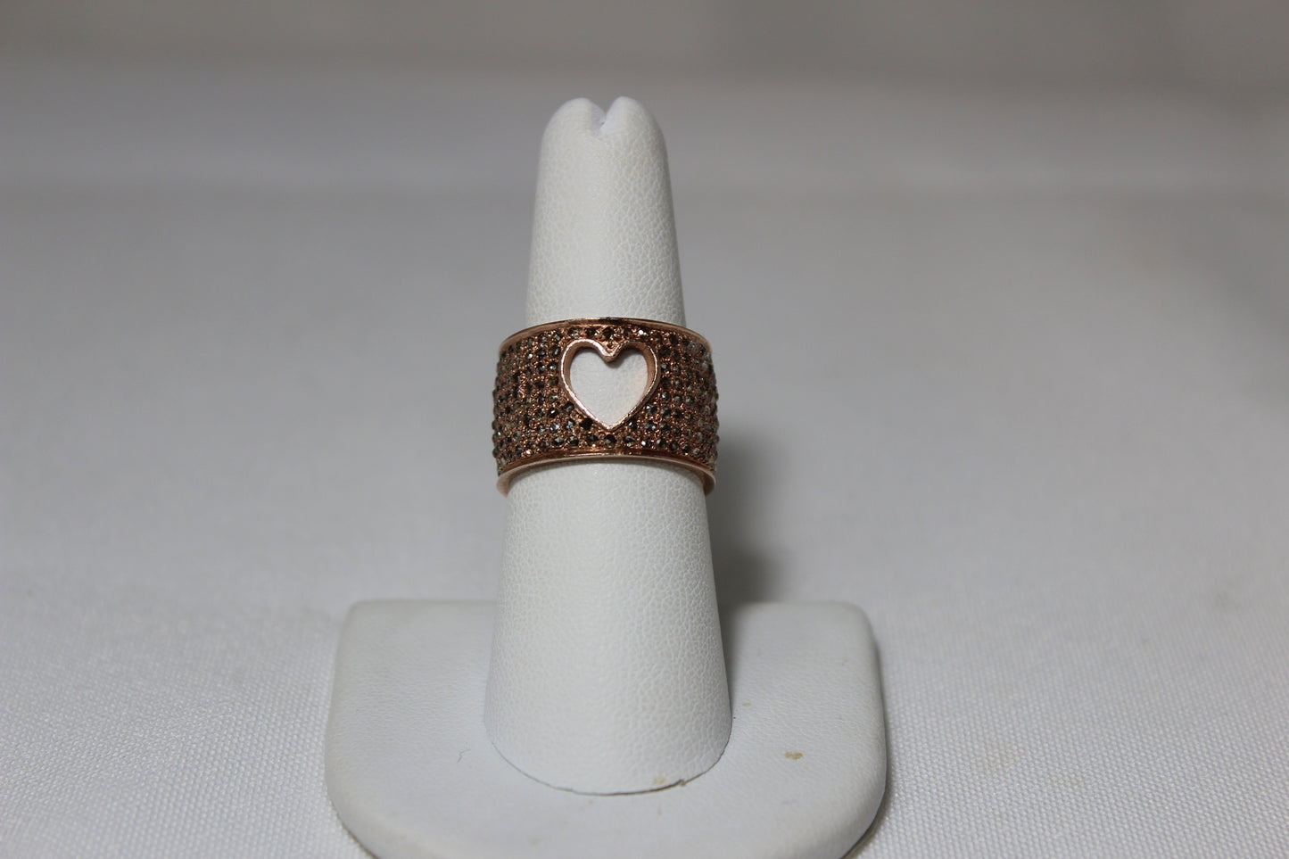 Pave diamond rose gold over sterling silver with cut out heart ring.  Size 7  Sourced from India