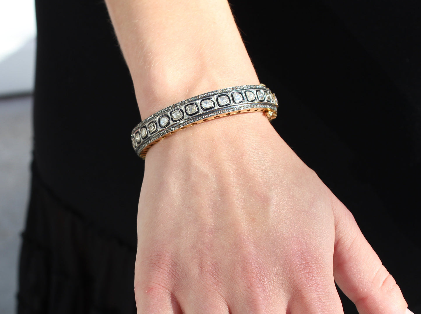 Rose cut diamond bangle with rhodium, oxidized sterling silver and yellow gold.   Sourced from India
