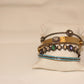 Turquoise enamel bangle with pave diamond middle band  Sourced from India